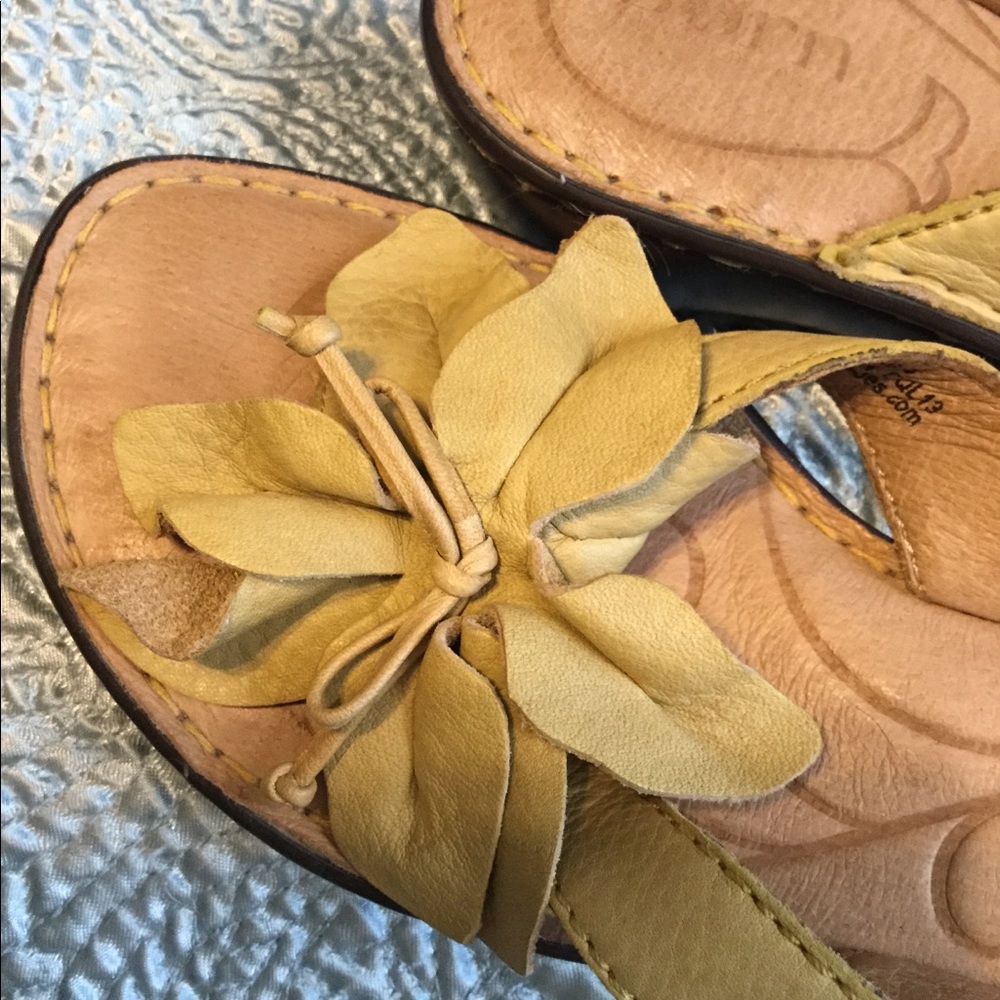 BORN slip on leather sandal with flower detail